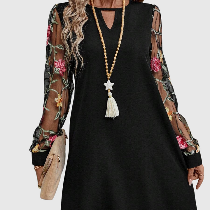 JOLANTA | Elegancka sukienka z dekoltem w kształcie litery V i wyrazistymi rękawami 