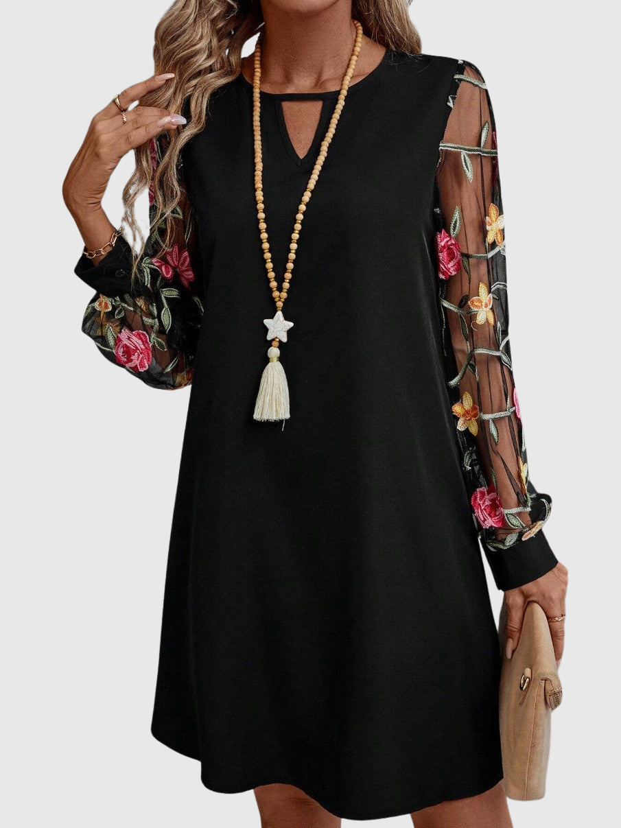 JOLANTA | Elegancka sukienka z dekoltem w kształcie litery V i wyrazistymi rękawami 