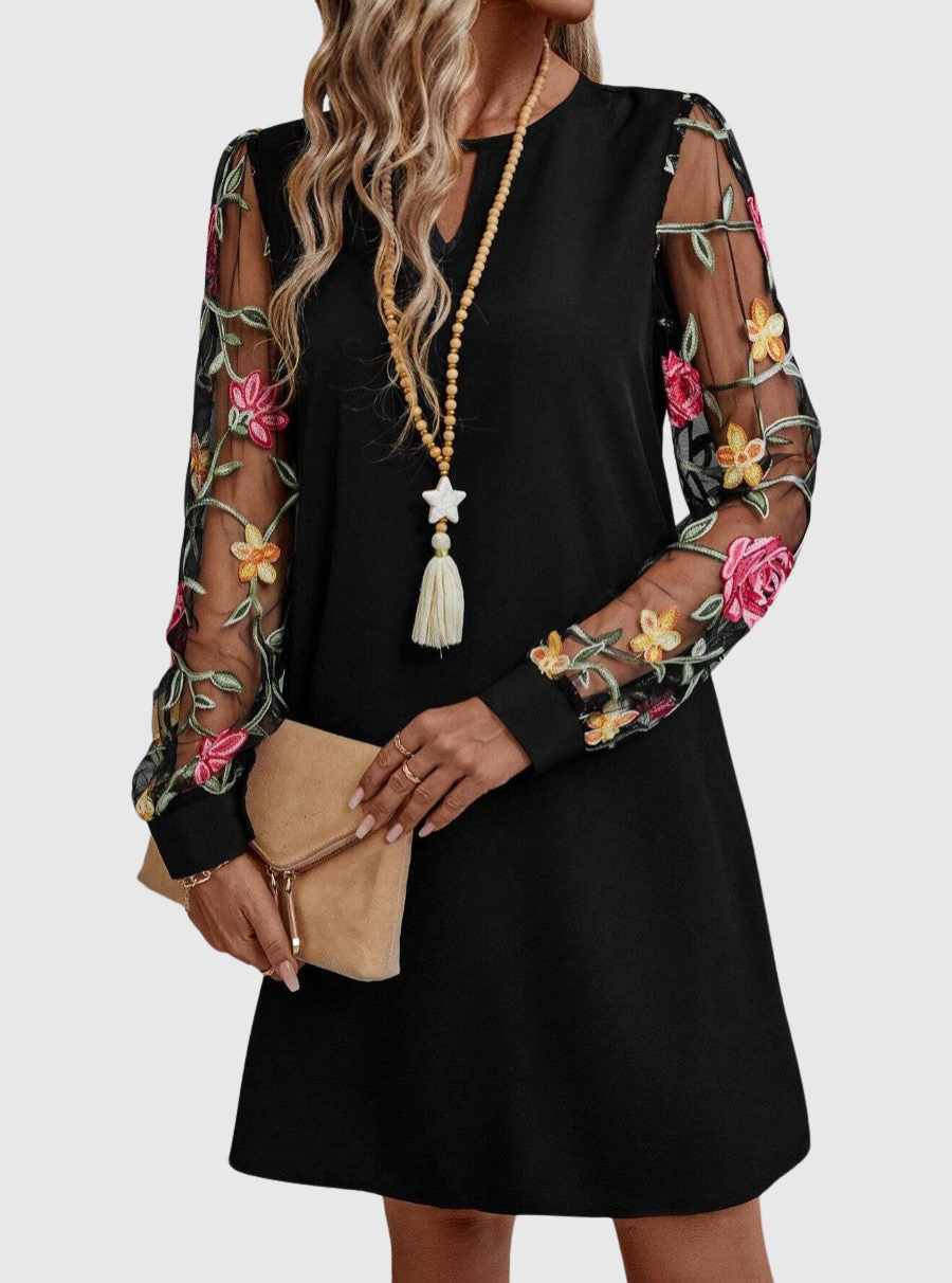 JOLANTA | Elegancka sukienka z dekoltem w kształcie litery V i wyrazistymi rękawami 