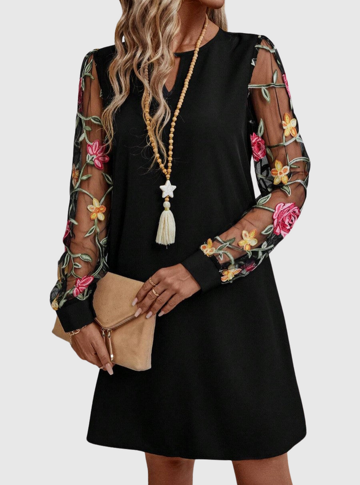 JOLANTA | Elegancka sukienka z dekoltem w kształcie litery V i wyrazistymi rękawami 