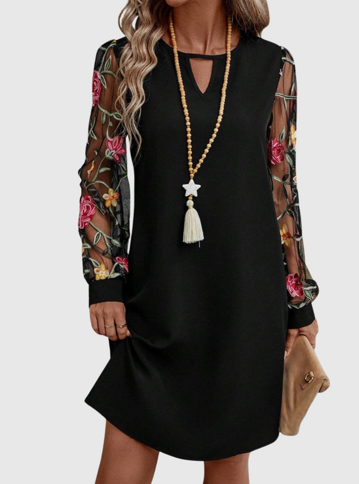 JOLANTA | Elegancka sukienka z dekoltem w kształcie litery V i wyrazistymi rękawami 